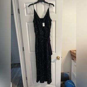 NWT. Black sequined wide legged jumpsuit